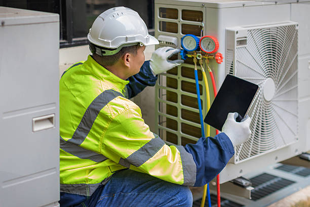 Professional Air Duct Cleaning technician working in Oakford, IN